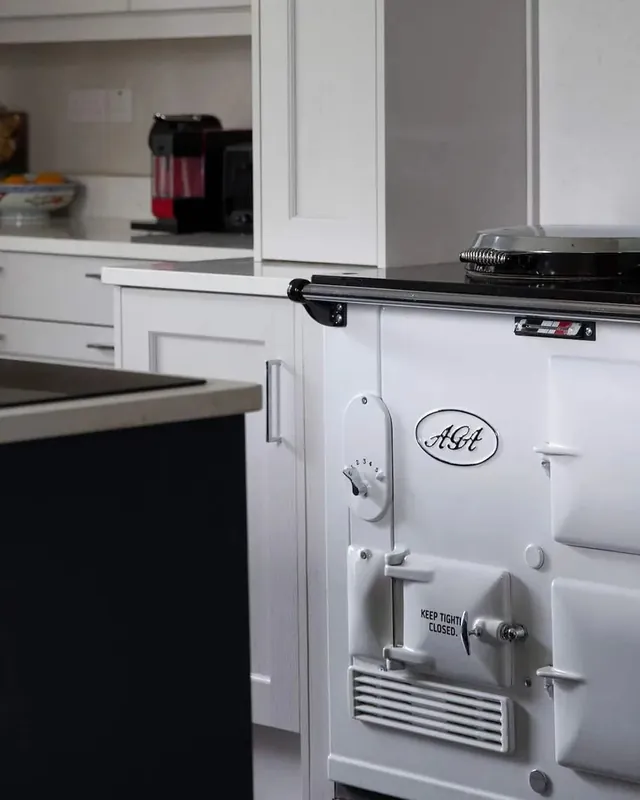 The cream AGA cooker in the kitchen at Mountrothe House
