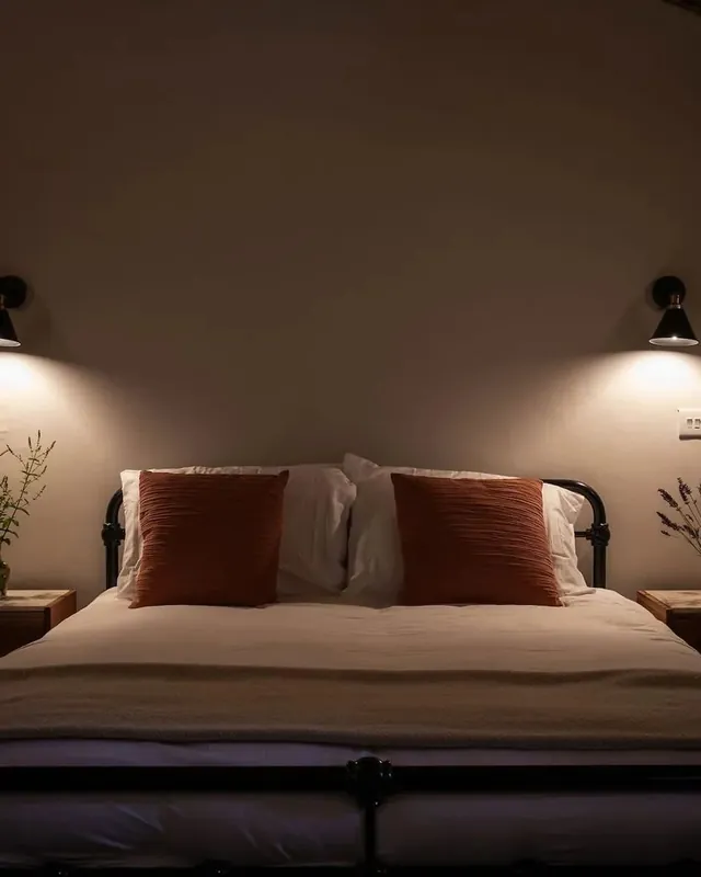 A king bedroom in the house's original vaulted basement